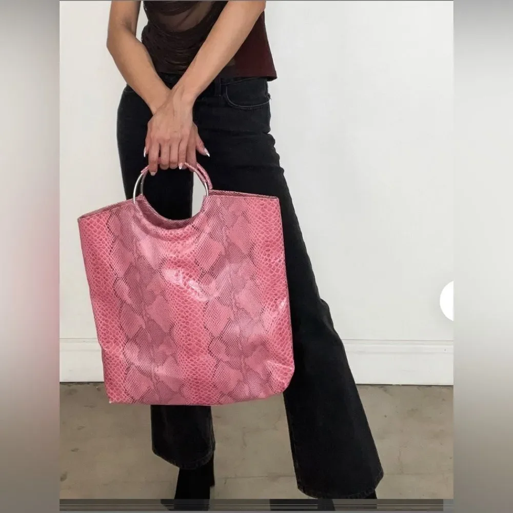 Kim Kardashian pink tote in faux snake print